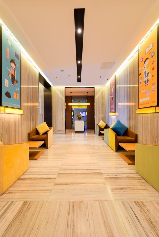 IU Hotel Zhanjiang Haibin Avenue Xinhaimingchen Bagian luar foto