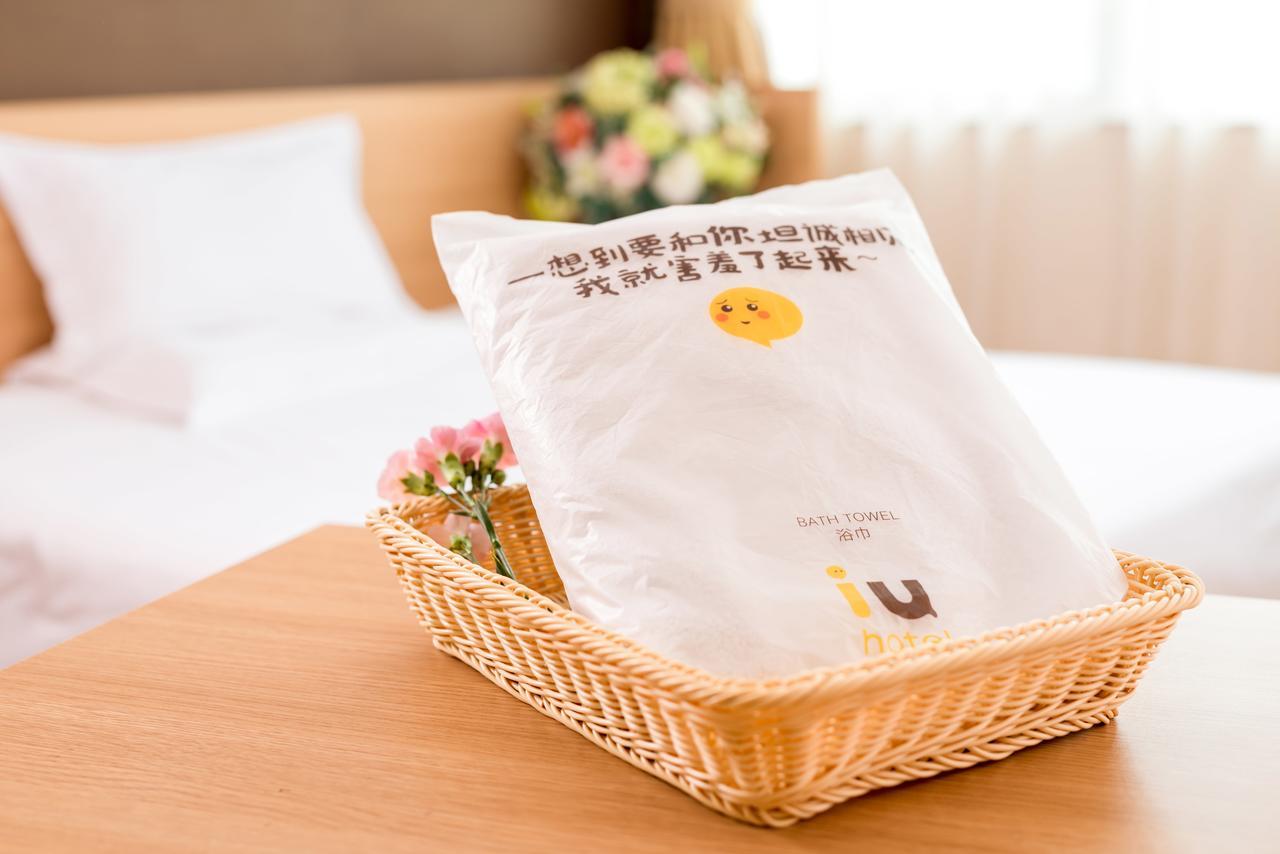 IU Hotel Zhanjiang Haibin Avenue Xinhaimingchen Bagian luar foto