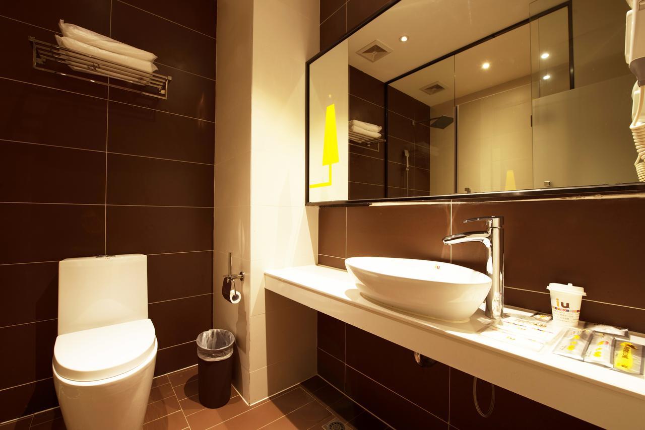 IU Hotel Zhanjiang Haibin Avenue Xinhaimingchen Bagian luar foto