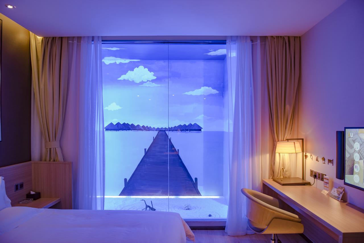 IU Hotel Zhanjiang Haibin Avenue Xinhaimingchen Bagian luar foto
