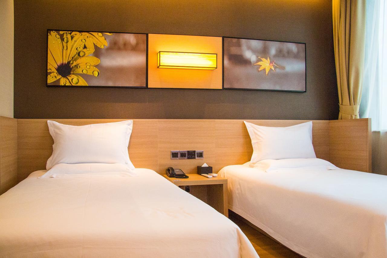 IU Hotel Zhanjiang Haibin Avenue Xinhaimingchen Bagian luar foto